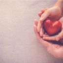 Adult-and-child-s-hands-holding-a-heart-together_876467247261864512